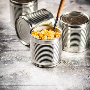 an-open-can-of-canned-corn-with-a-spoon-2023-11-27-05-18-49-utc-scaled-1.jpg