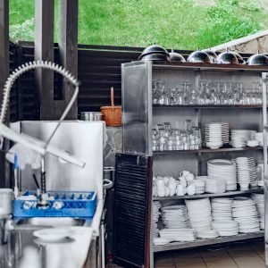 clean-outside-restaraunt-kitchen-full-of-dishes-2023-11-27-04-58-21-utc-scaled-1.jpg