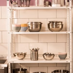 close-up-view-of-various-kitchen-supplies-on-shelv-2023-11-27-05-29-20-utc-scaled-1.jpg