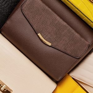 flat-lay-with-collection-of-woman-handbags-shoppi-2023-11-27-04-50-30-utc-scaled-1.jpg