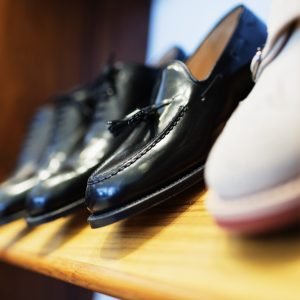 formal-shoes-arranged-in-shelf-at-clothing-store-2023-11-27-05-31-46-utc-scaled-1.jpg