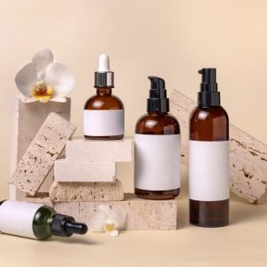 glass-cosmetic-bottles-near-white-orchid-flowers-a-2023-11-27-04-50-59-utc-scaled-1.jpg