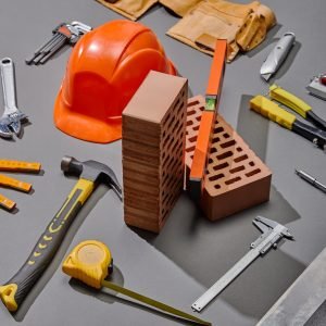 high-angle-view-of-bricks-industrial-tools-and-he-2023-11-27-05-15-11-utc-scaled-1.jpg