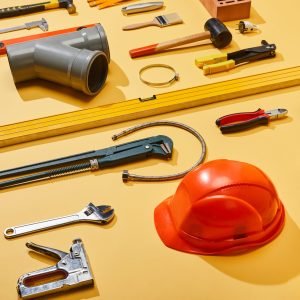 high-angle-view-of-industrial-tools-helmet-brick-2023-11-27-05-24-01-utc-scaled-1.jpg